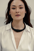 Load image into Gallery viewer, Appreciate the soft feel and cross-section of leather with this beautifully crafted choker, perfect for effortlessly putting together a chic look. Our WAIWAI chokers are the softest, lightest, and most comfortable you will ever wear, with no resistance against your neck. The absence of a clasp allows the choker to be worn with the opening at the front and flexes easily to put on and adjust to neck size. Shop now for a statement piece that combines style and comfort.