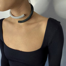 Load image into Gallery viewer, Made from individually punched genuine leather sequins and stainless steel memory wire, this choker is the softest, lightest, and most comfortable choker you will ever wear. It flexes easily to put on and adjusts to neck size, with absolutely no resistance against your neck, allowing you to forget its presence. With no clasp, this choker can be worn with the opening at the front.